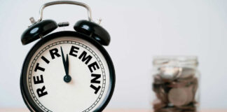 Alarm clock showing retirement and jar of coins