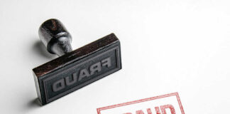 Fraud stamp and red stamped imprint on paper