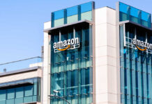 Exterior view of an Amazon corporate building with a glass facade