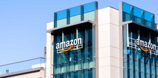 Exterior view of an Amazon corporate building with a glass facade