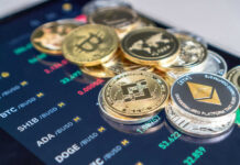 Cryptocurrency coins on digital trading screen
