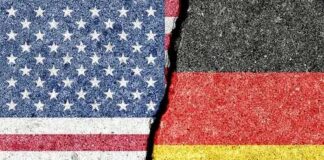 Torn representation of the American and German flags