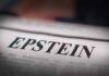 Close-up of a newspaper headline reading 'EPSTEIN'