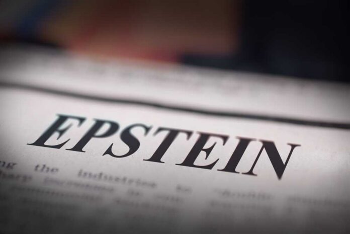 Close-up of a newspaper headline reading 'EPSTEIN'