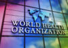 World Health Organization logo on a colorful glass building
