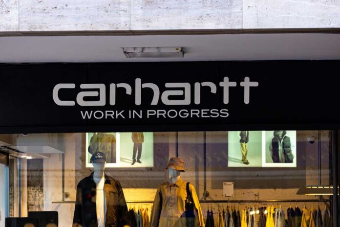 Clothing store display featuring mannequins in stylish outfits