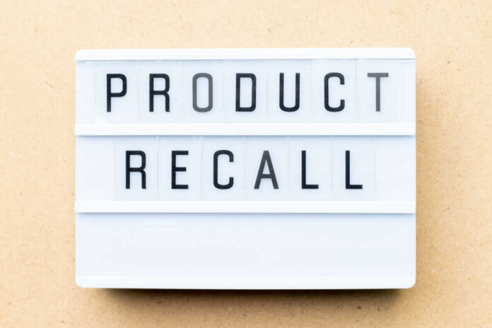 White,Lightbox,With,Word,Product,Recall,On,Wood,Background Lightbox sign with the words product recall on a beige background