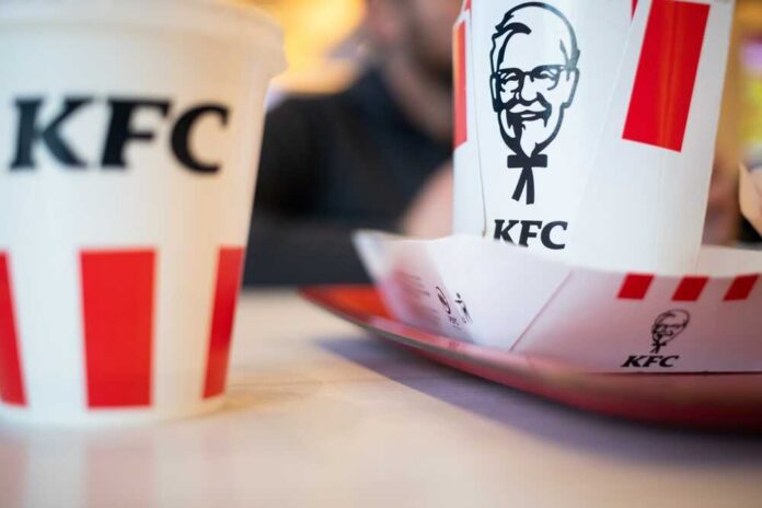 Exterior view of a KFC restaurant with its iconic logo